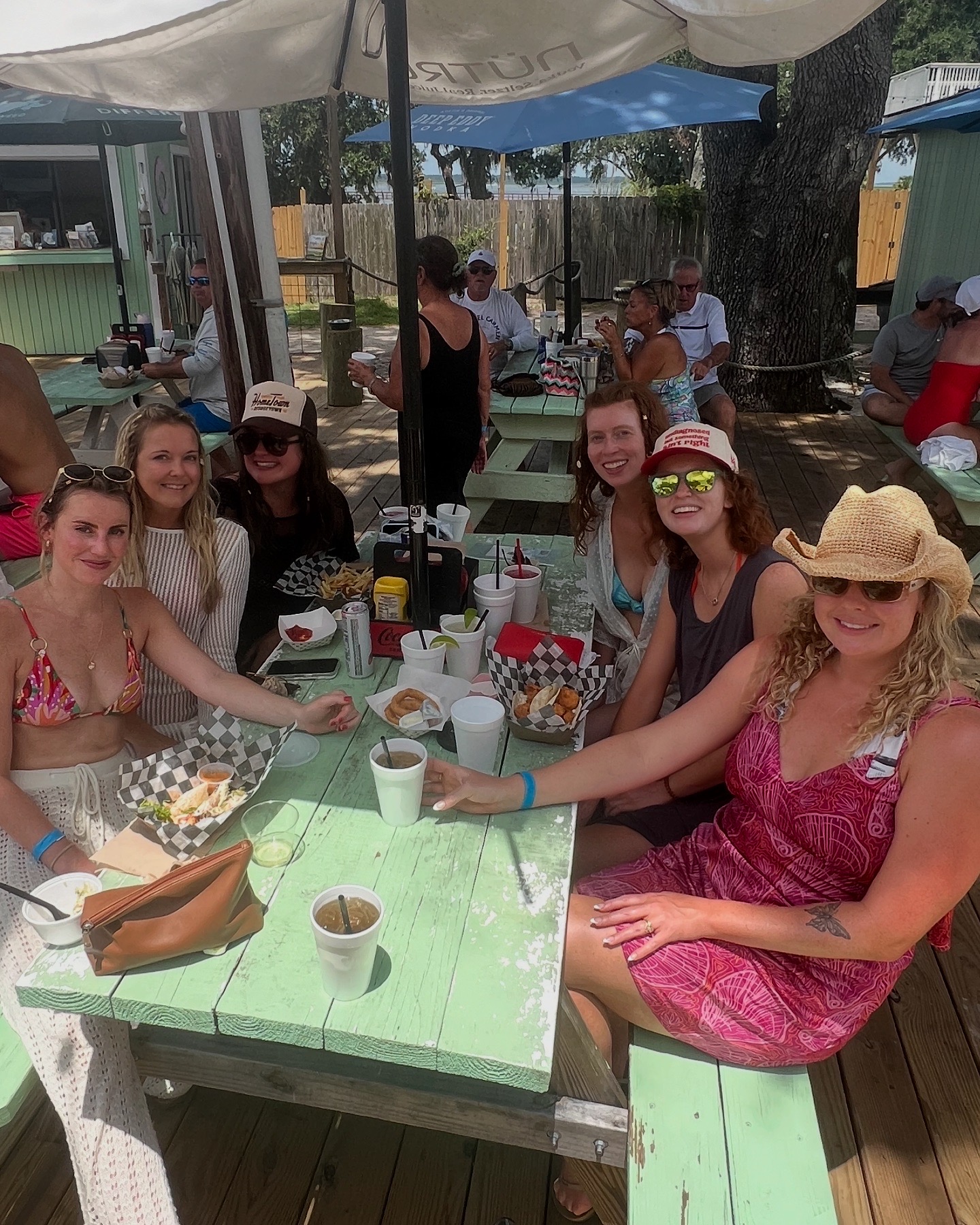 A group of young women having lunch at Daufuskie Island Crab Company